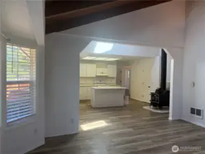 From living room to kitchen and wood stove.