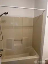 Bath and shower combo.