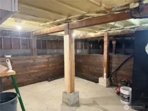 North part of the basement can be used for a shop, storage or hobby room.