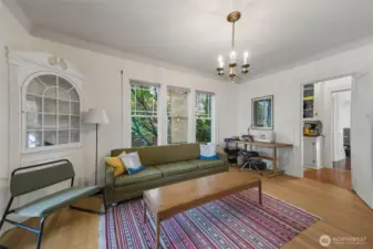 Unit B dining room with built in hutch, currently used as den.
