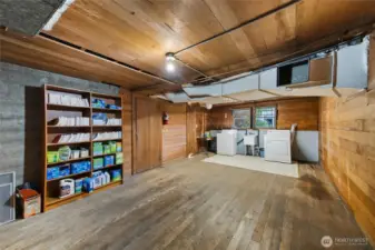 Unit A Laundry and storage. Additional store room (with floor) through door at right of shelving
