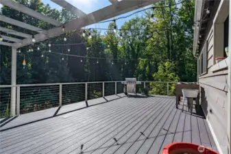 Enjoy a spacious deck with peaceful views of the ravine