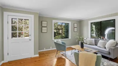Bright entry space with natural light streaming through large windows