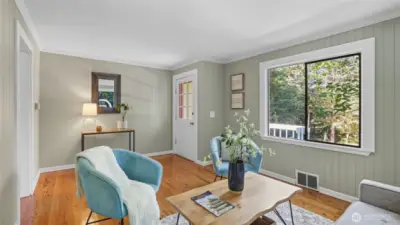 Charming details like crown molding & wood panel walls add a timeless appeal.