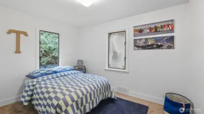 Versatile room perfect for a guest bedroom, office, or play space.