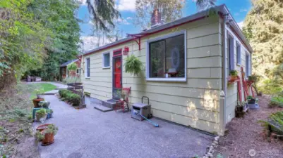 Step outside to this private outdoor setting framed by mature trees and natural landscaping.