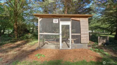 Farm-fresh living made easy with this established chicken coop.