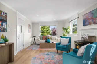 Lots of natural light in the living room with windows on the East and South sides.