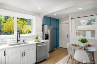 Plenty of light with windows on the East and West in the eat-in Kitchen. Plus a brand new stainless steel fridge. A back door leads to the large deck.