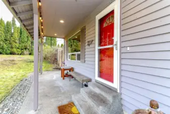 A front patio greets you upon making your way to the front door.