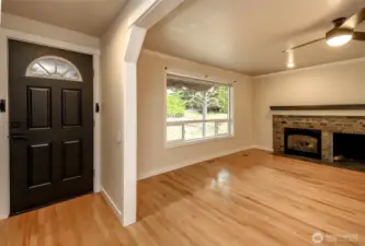 Step inside to find solid and engineered wood flooring throughout.