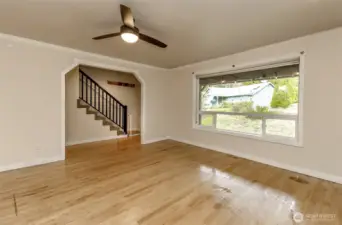 Spacious and open living area sits just off the entrance of the home.