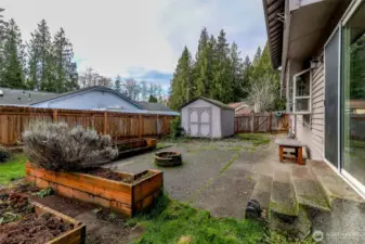 Step outside to find a spacious backyard and patio.