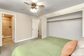 Ceiling fans circulate fresh air throughout the bedroom.