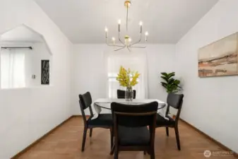 Separate dining room adjacent to living and kitchen