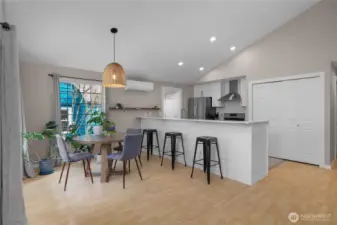 Long eating bar in the Stainless and Stone Kitchen.