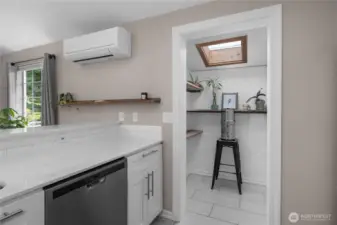 Through this door is the kitchen entry to access the covered walkway to the garage. A great 'drop-zone'.