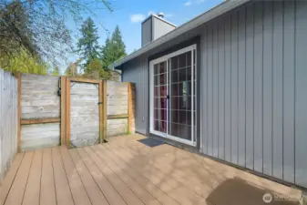 Enjoy direct access to a secluded side deck for morning coffee, afternoon BBQs, or evening relaxation.