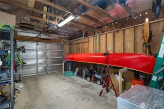 Garage interior provides flexible utility for projects, equipment, and additional storage needs.