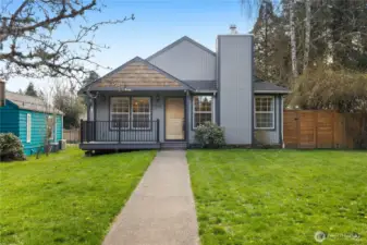 Fresh exterior updates and a welcoming covered front porch create standout curb appeal.