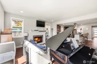 The Fireplace centers the room and brings Warmth to the Whole Home