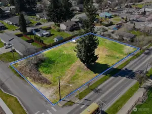 Corner lot with additional alley access. Blue boundary lines are approximate. Buyer to verify to their own satisfaction.