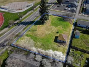 Seller has already done the hard work. Permits for 5 story building offering three commercial spaces and 62 residential units are ready to be picked up and construction started. Blue boundary lines are approximate. Buyer to verify to their own satisfaction.