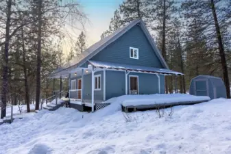 North side of Home with covered deck.