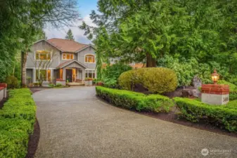 This beautiful home features 6100* sq ft on a 1.8 acre lot backing to open space.