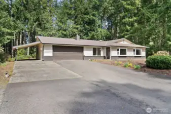 Enjoy a spacious lot with wooded views.