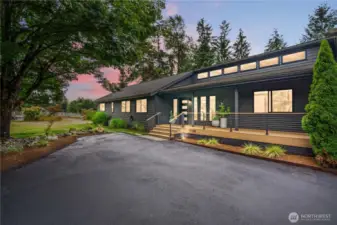 Main entrance welcomes you with sprawling front porch.