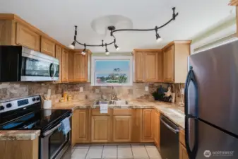 Beautiful kitchen with lots of natural light.