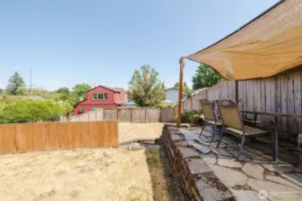 Large backyard perfect for entertaining and gardening.