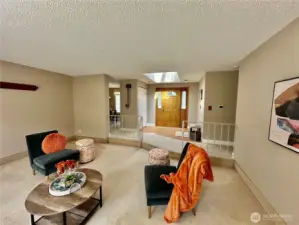 From living room looking to entry with skylights.