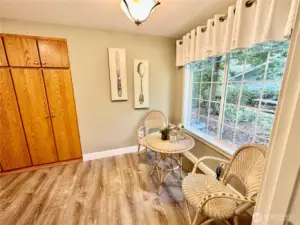 Charming nook area off kitchen.  Ample pantry to the left.