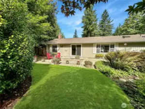 Rear view of home and large patio ideal for enteraining.