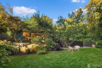 Enjoy peaceful serenity in this private and sprawling backyard