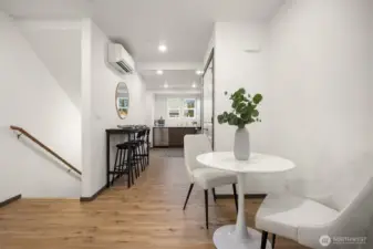 The open living area offers a warm and inviting space to gather, relax, and connect.