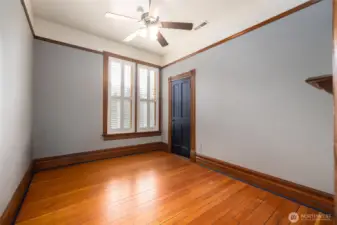 Gleaming wood floors in upstairs bedroom.