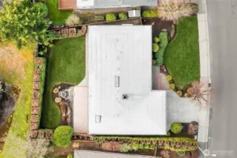 Fully-fenced lot perched on top of the hill.