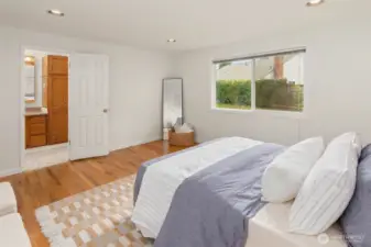 Primary bedroom is connected to the full hall bathroom.