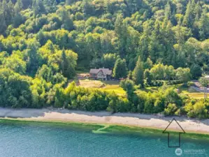 Six acres plus tidelands. Two tax Parcels.