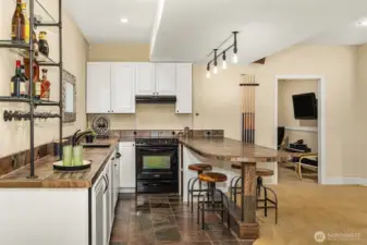 Lower level second kitchen.