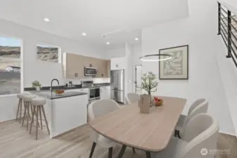 Main-level photos have been virtually staged to highlight the home's full potential.