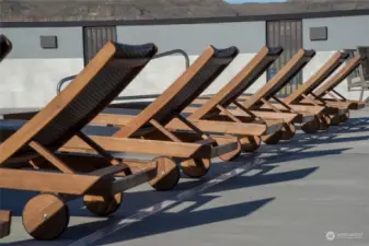 Poolside chairs perfect for relaxing and lounging in style.