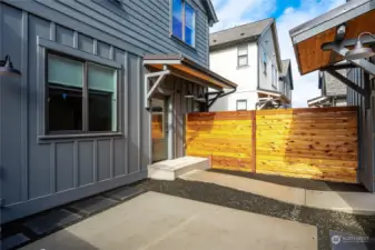 Enjoy quiet relaxation in the private, no maintenance Courtyard, situated between your home and the Garage. This space features gravel & pavers for flexibility in use and a gas tap for convenient grilling or personal firepit. “Right Sized”, 22’ wide 2-Car Garage is to the right.