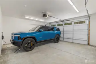 "Right Sized" 22' wide 2-Car Garage features a 240v Level-2 EV charging outlet.