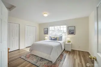 A third bedroom with double closets is also offered upstairs.
