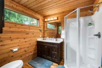 Primary bathroom with large walk-in shower.