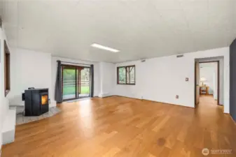 Lower level massive family room, so much space here plus a pellet stove that efficiently heats the whole lower level! This room is very big (need to see in person) and has tons of options for either a game room, tv or media room or a separate family room.